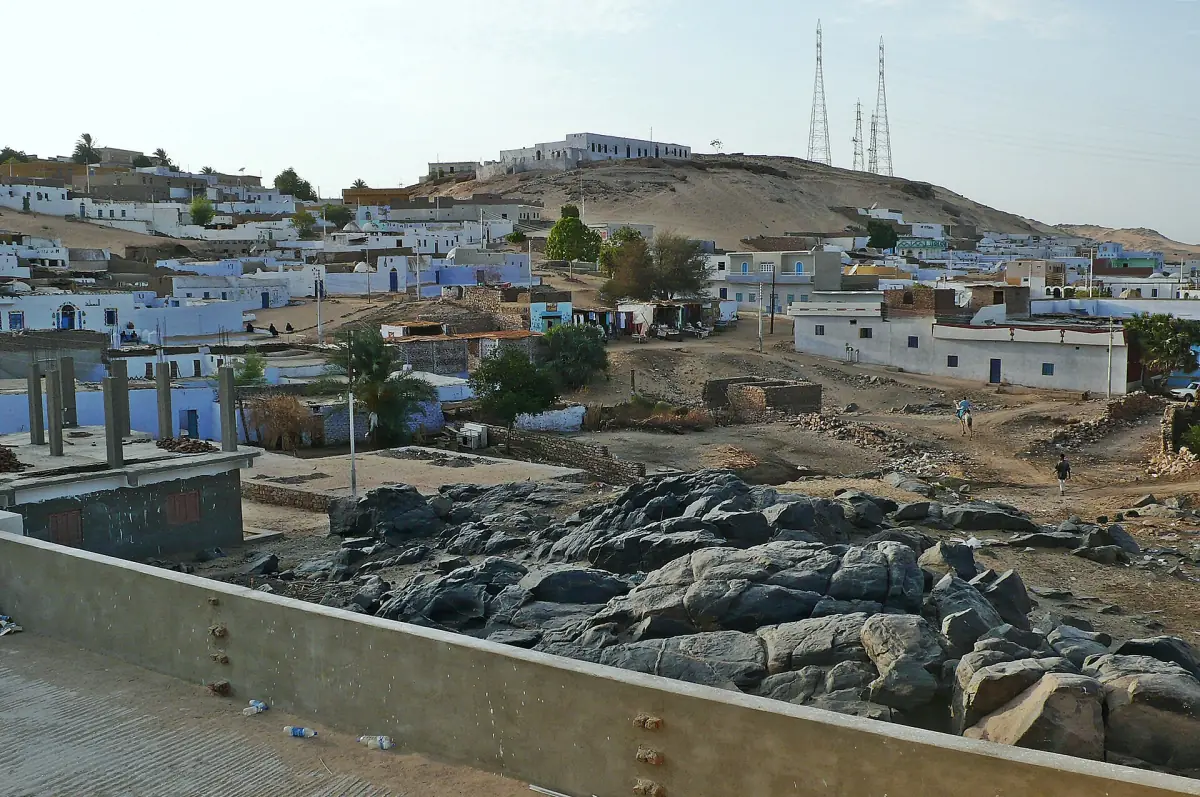 Blue and white Nubian houses on the west bank of the Nile at Aswan
